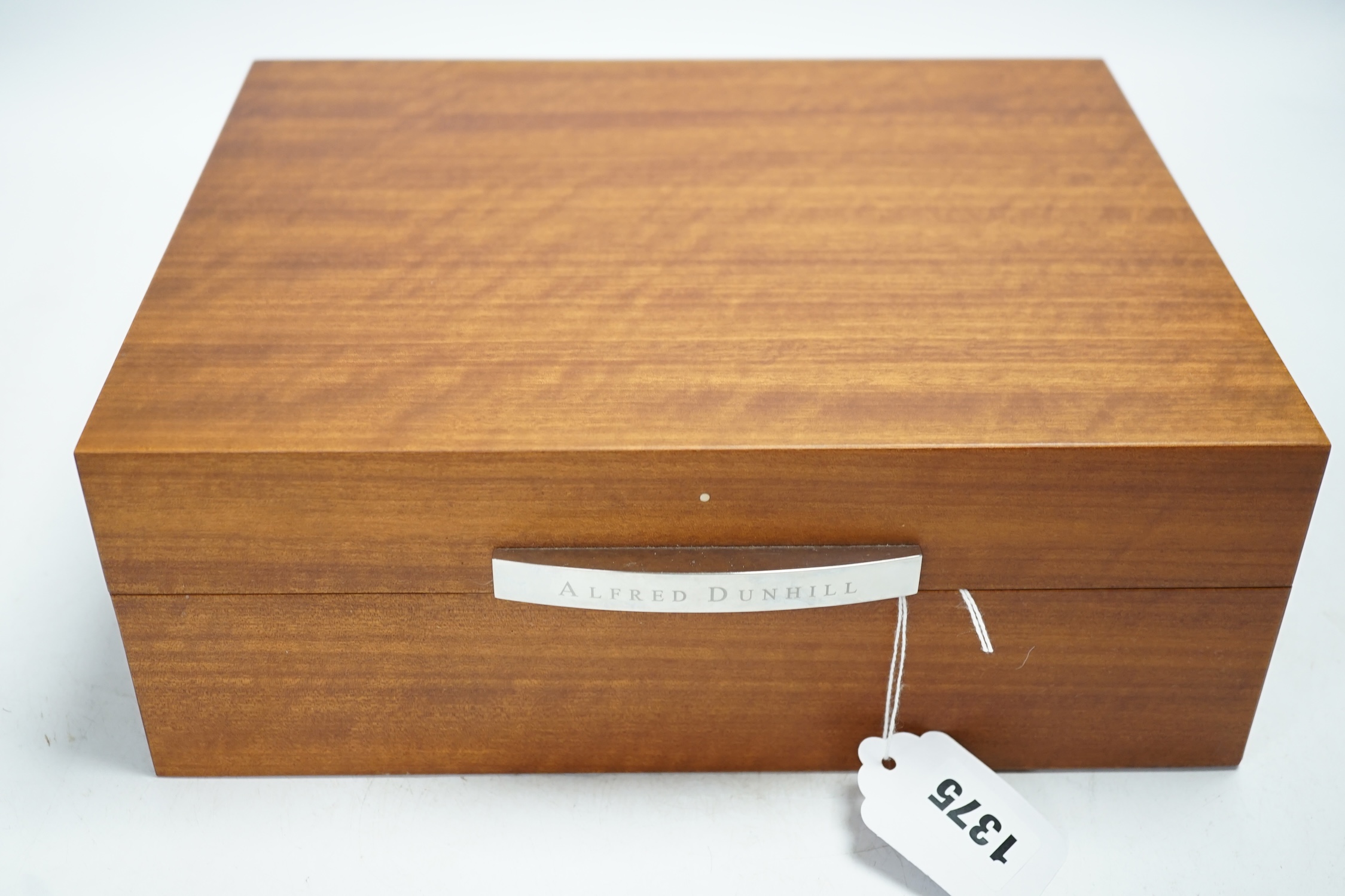 An Alfred Dunhill humidor containing partagas cigars, cutter etc., case 28cm wide. Condition - fair to good